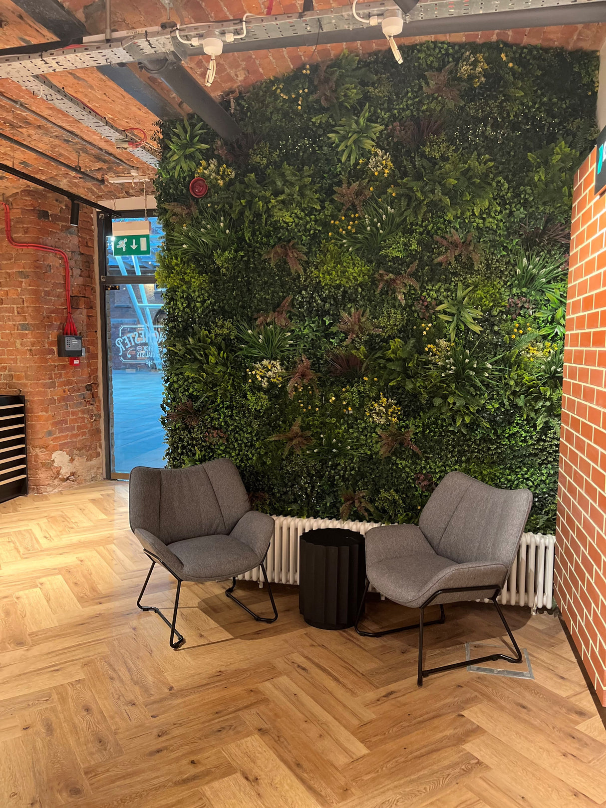 Artificial green wall 1m2 panel with mixed green foliage with yellow and white flowers