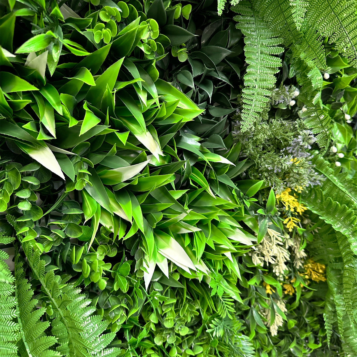 Artificial green wall 1m2 panel with mixed green, white and purple plants