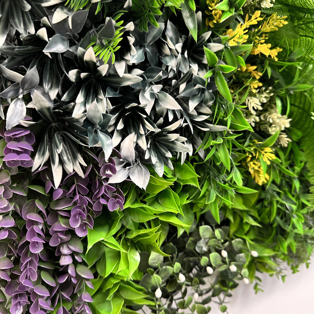 Artificial green wall 1m2 panel with mixed green, white and purple plants