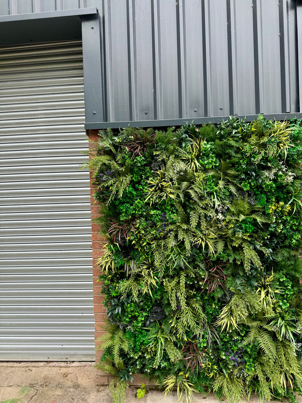 Ultra Realistic Artificial 3D plant wall PW25 with lush dark and light green foliage, yellows  and whites 100x50cm