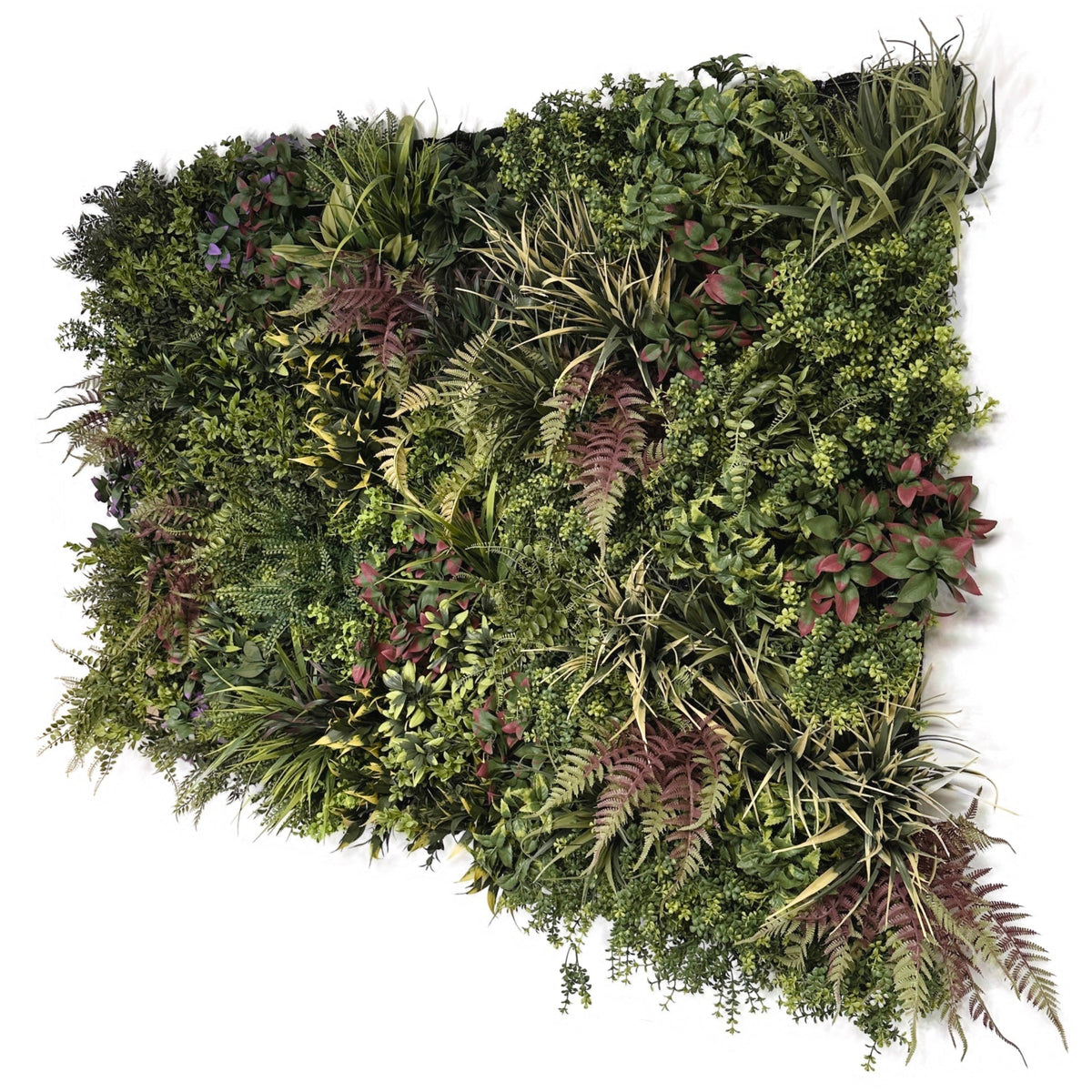 Artificial green foliage wall panel, angled view with hanging fronds and mixed leaf texture