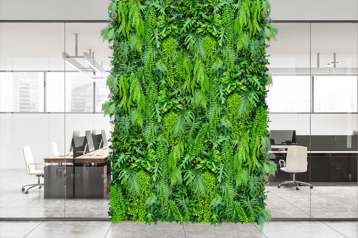 Artificial tropical plant wall panel with dense green foliage and long trailing vines