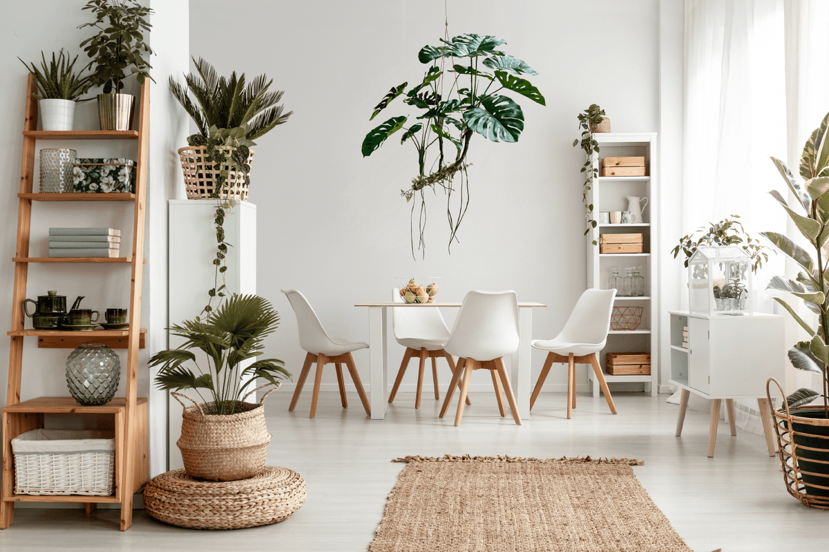 Artificial hanging monstera plant with multiple green leaf clusters and long hanging vines