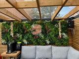 Artificial green wall panel with variegated foliage ivy palms grasses and ferns
