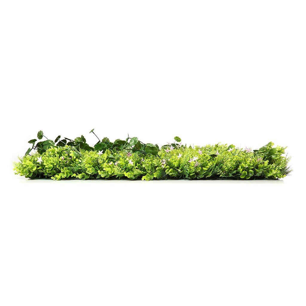 Artificial green plant wall panel, rectangular, dense foliage with tiny flower accents