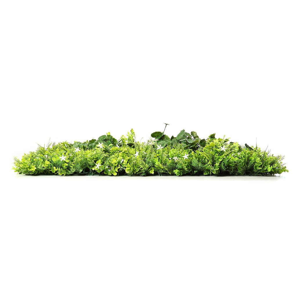 Artificial green plant wall panel in a thin horizontal profile with dense foliage