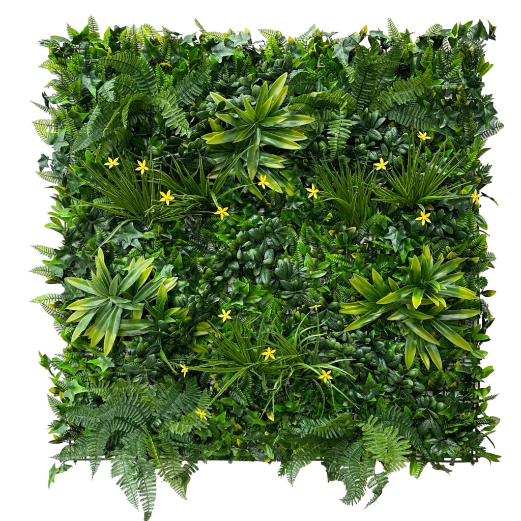 Artificial green wall panel close-up of lush green leaves with tiny yellow flowers