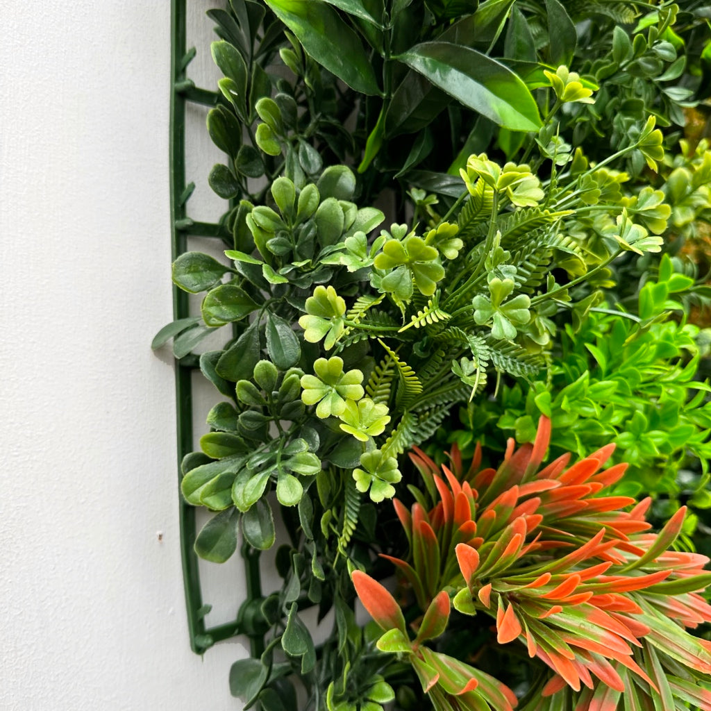 Green wall panel variegated  green foliage  palms heads, green & white tipped  grasses & orange tipped bushes 100x100 cm
