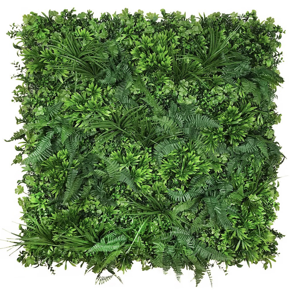 Square artificial foliage wall panel with dense mixed green leaves and ferns