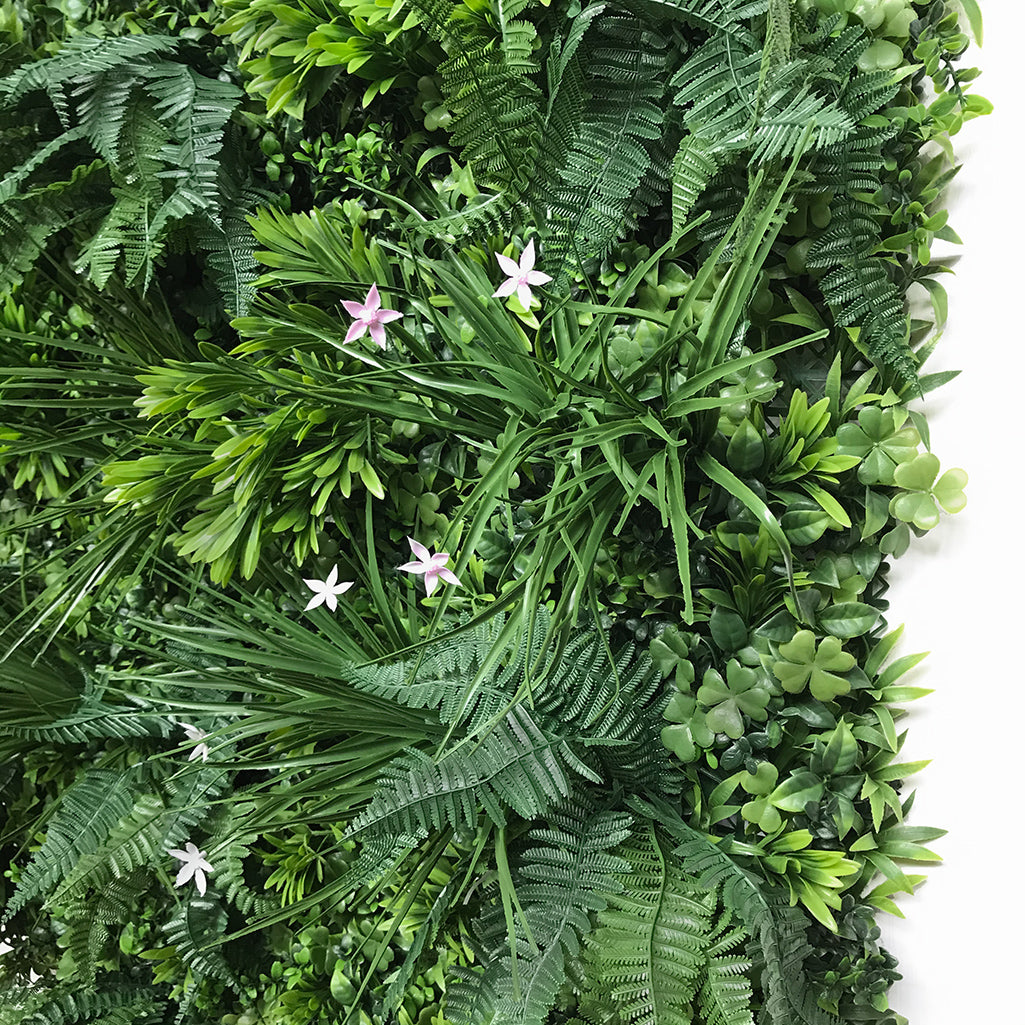Artificial green wall panel with mixed 3d light-dark green foliage with scheffleras & pink flowers 100x100 cm
