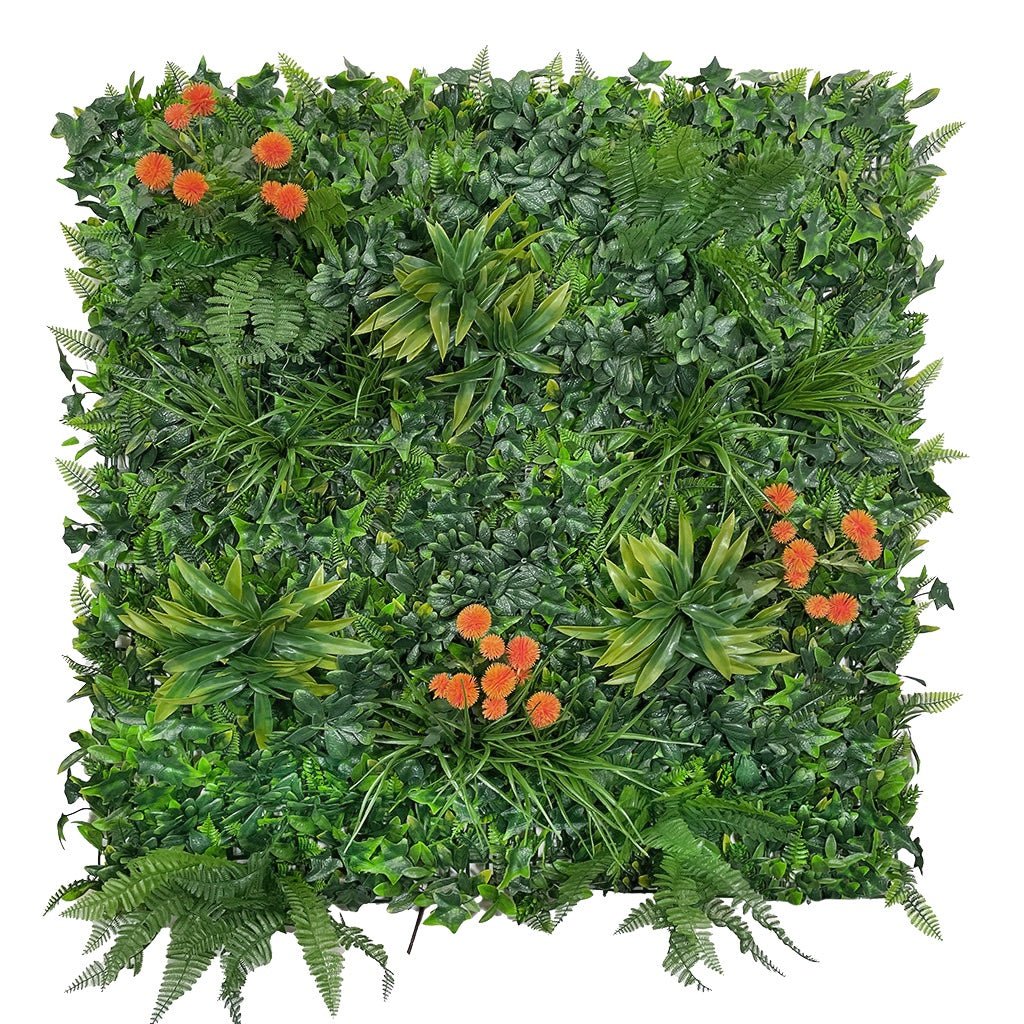 Artificial tropical green foliage wall with orange dahlia-like flowers in a full panel