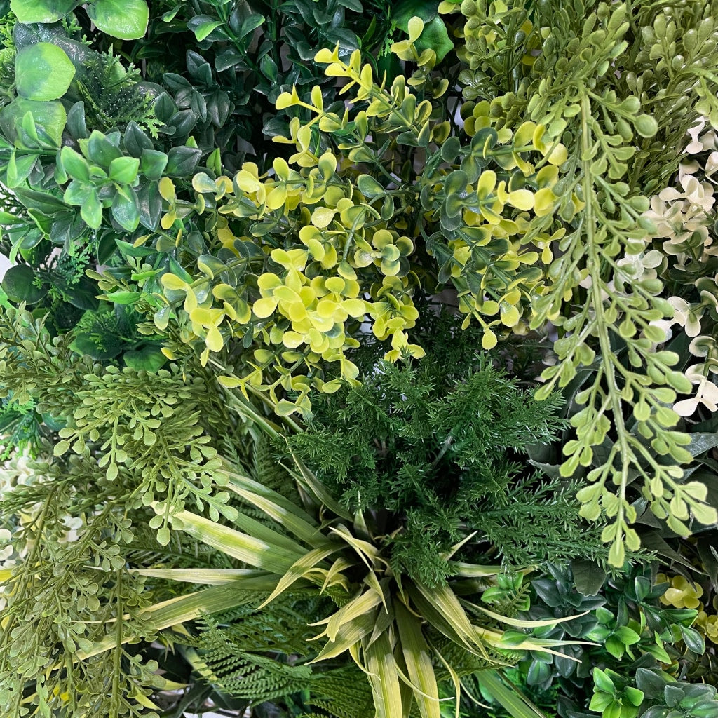 Premium realistic artificial 3D plant wall PW23 with lush green with yellow and white foliage 100x50cm