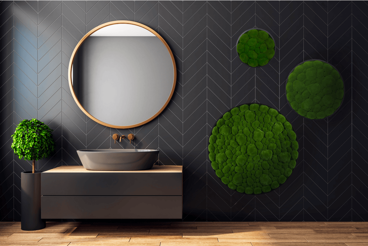 Green artificial moss circular wall art panels with dark frames.