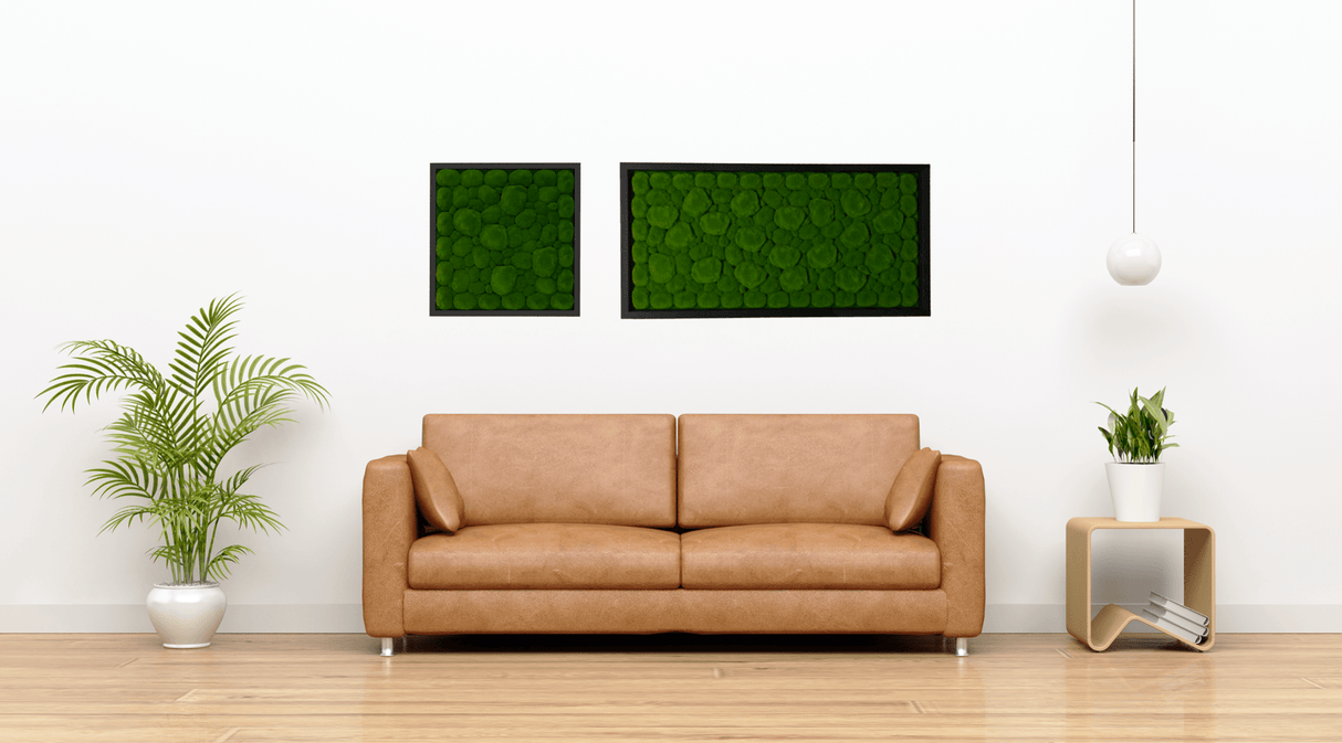 Two black-framed artificial moss wall art panels with green textured, tufted rectangles.