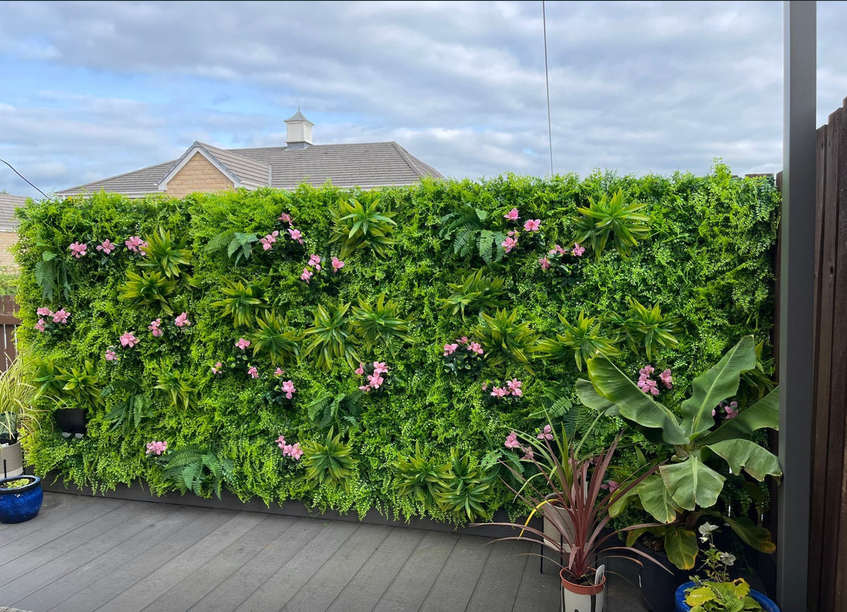 Artificial green wall panel with  ferns palms and pink flowers 100x100 cm