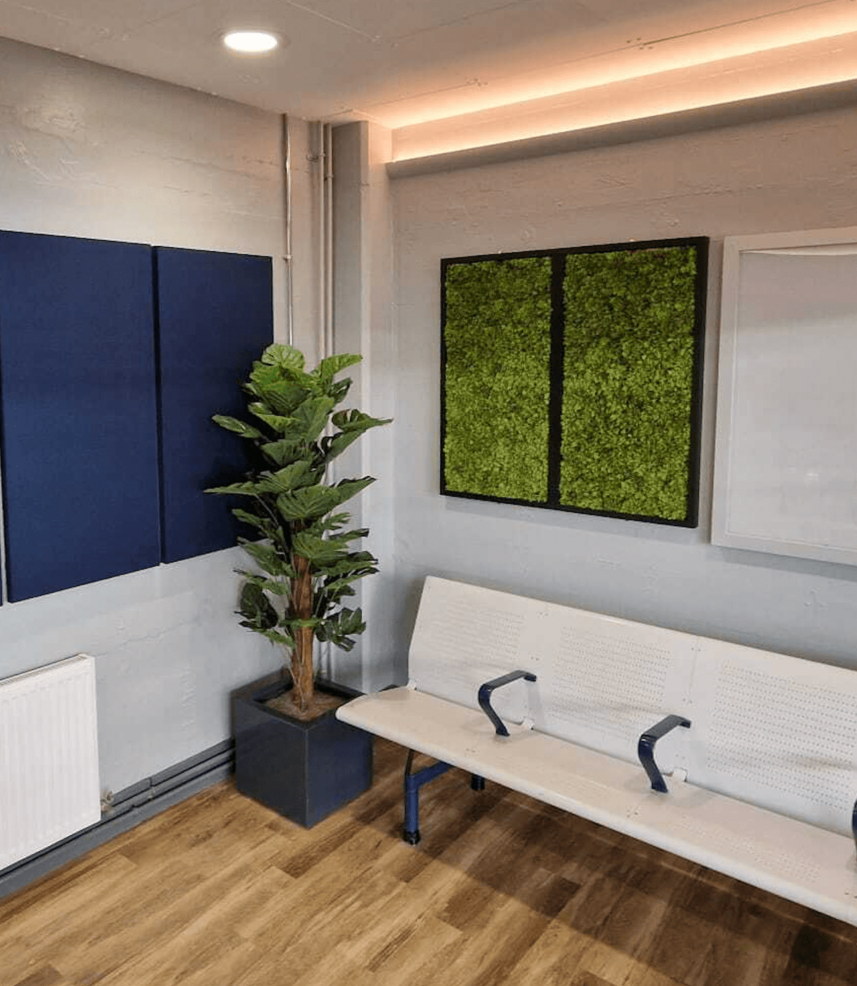 Artificial reindeer moss wall panel with black aluminium frame, green textured rectangle