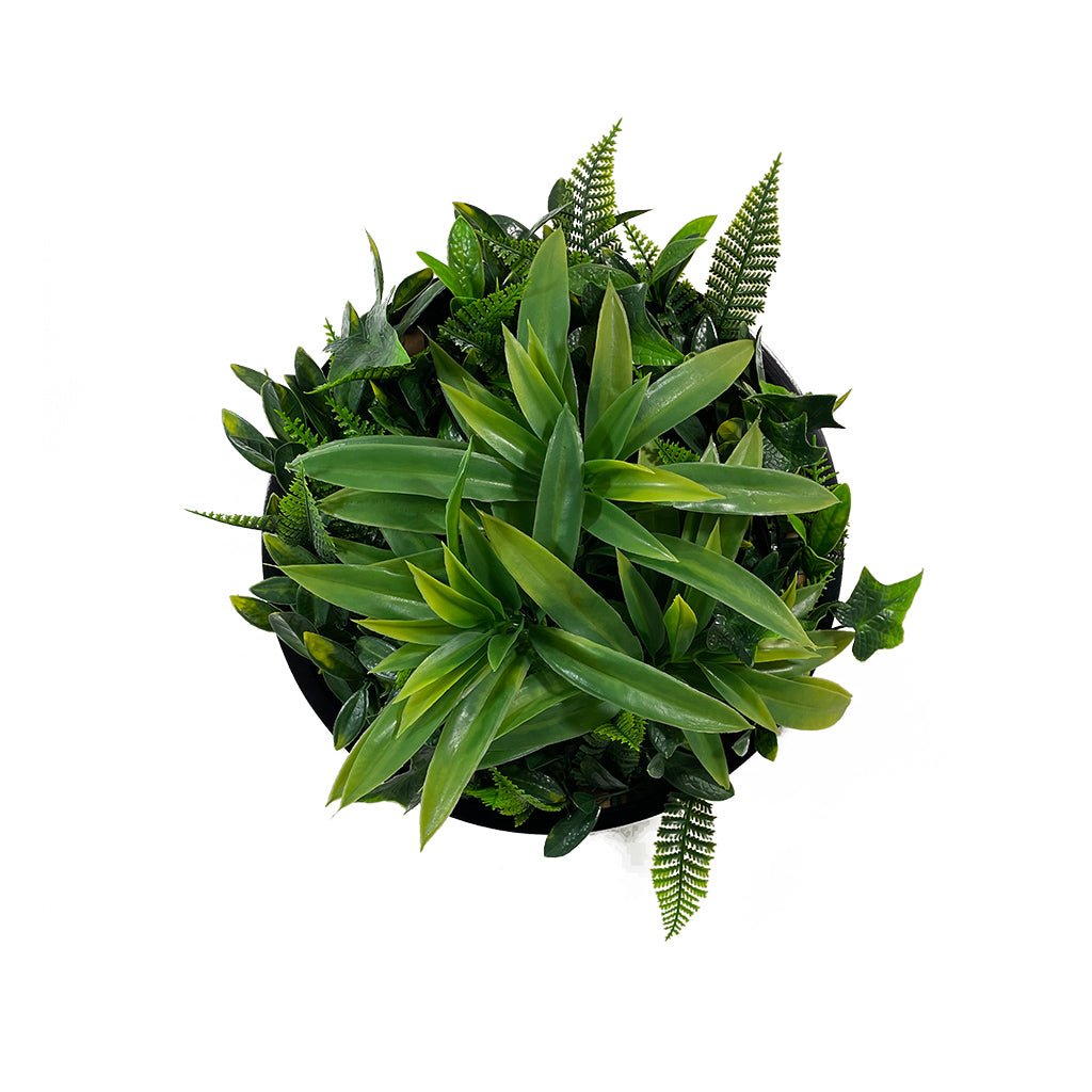 Black-backed circular artificial foliage wall panel with lush green leaves