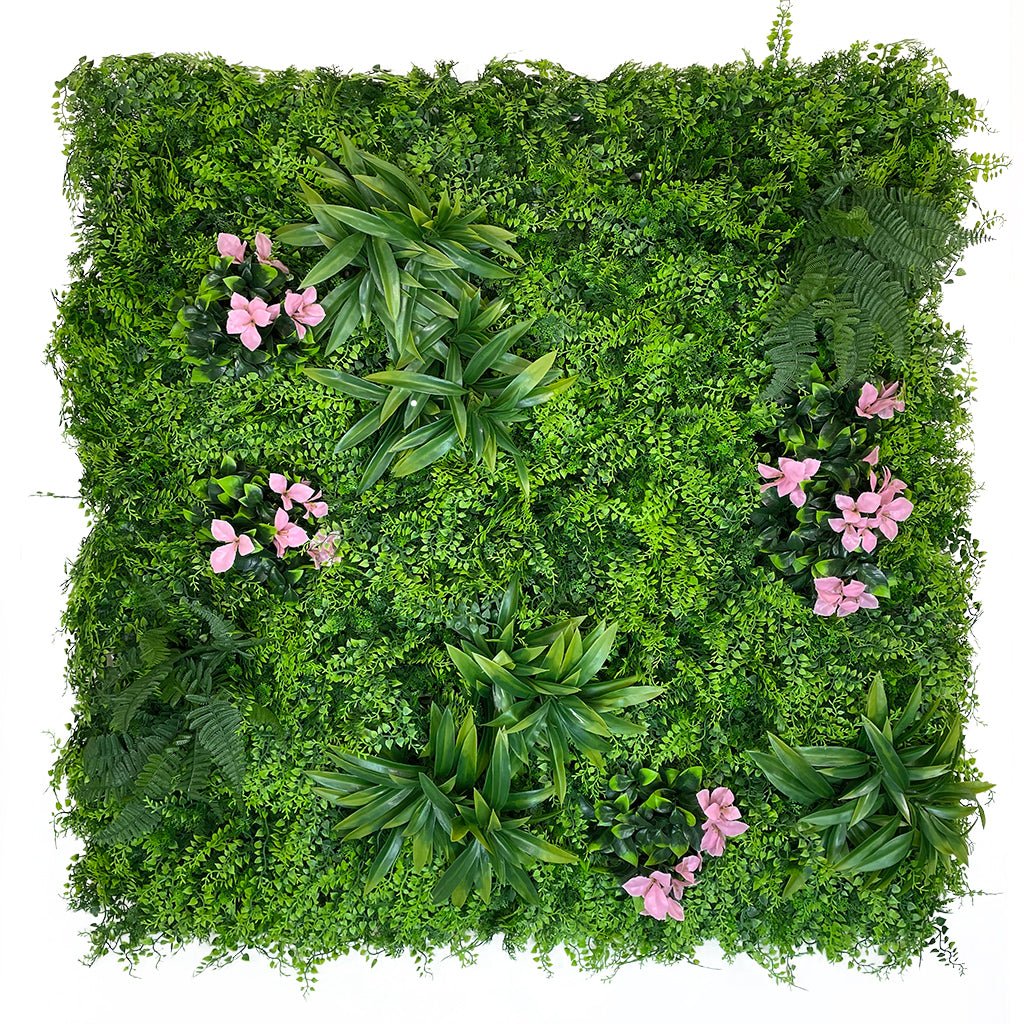 Artificial green wall panel with dense greenery and pink blossoms, square layout
