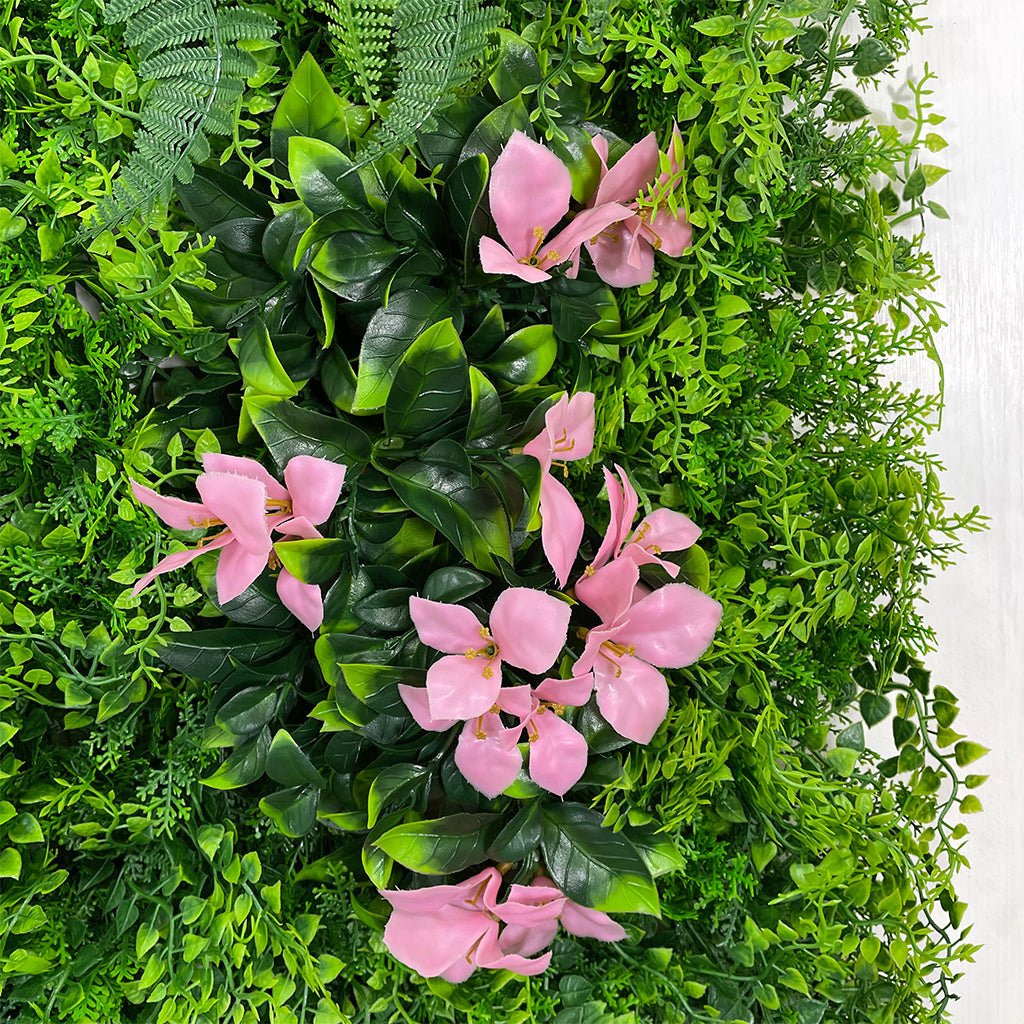 Artificial green wall panel: ferns, palms and pink flowers, square 100x100 cm