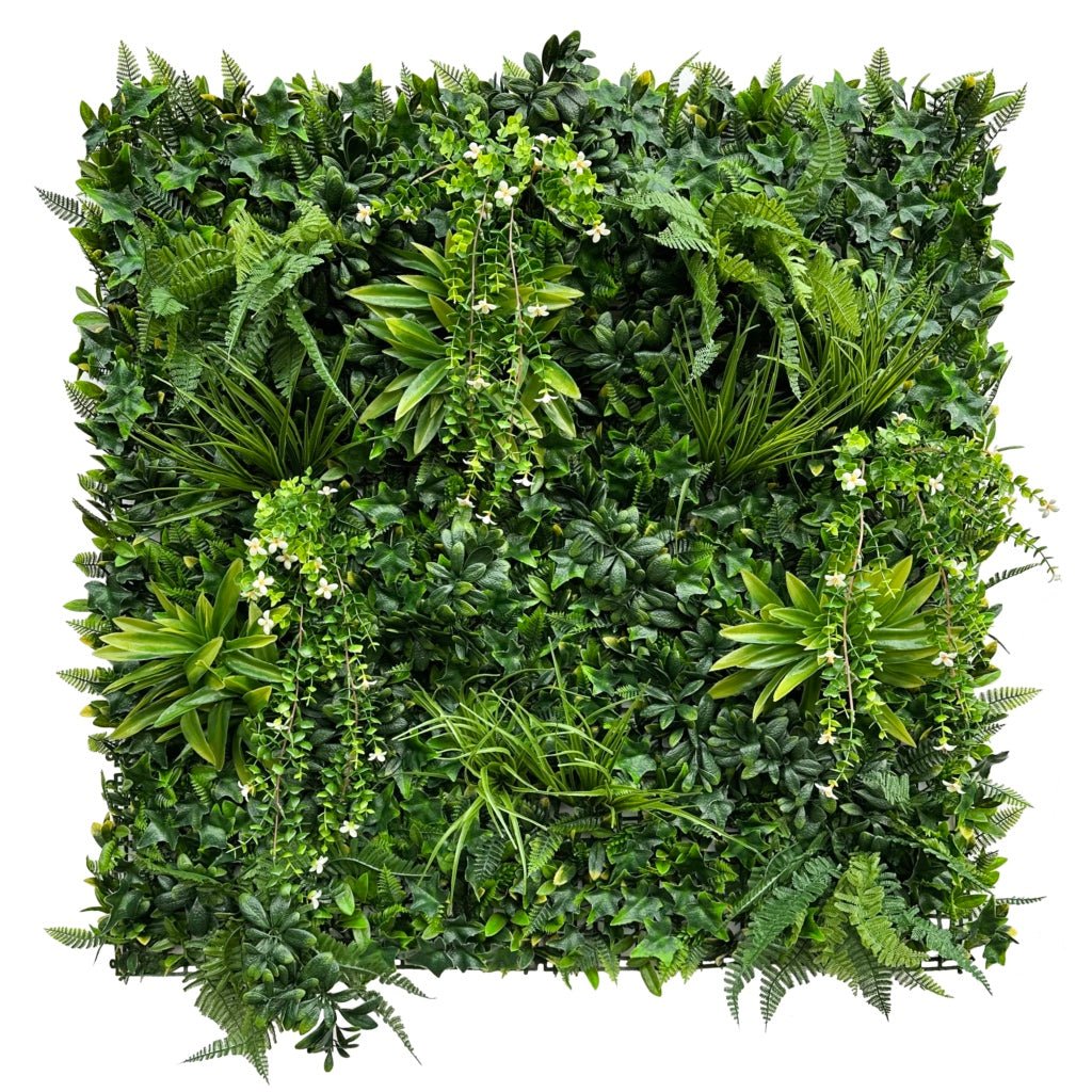 Artificial green foliage wall panel with variegated leaves and small white trailing flowers