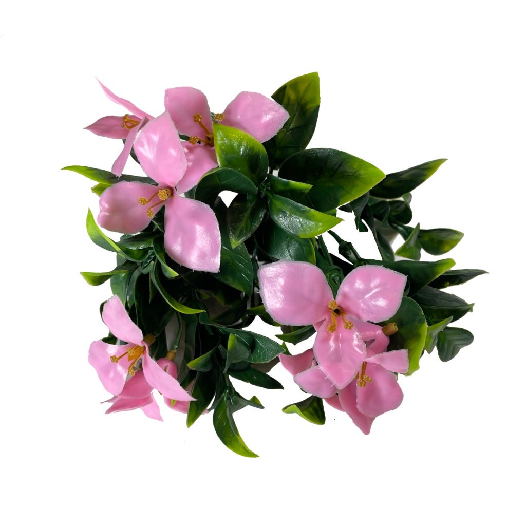 Artificial flower bundle with pink five-petal blossoms and green leaves