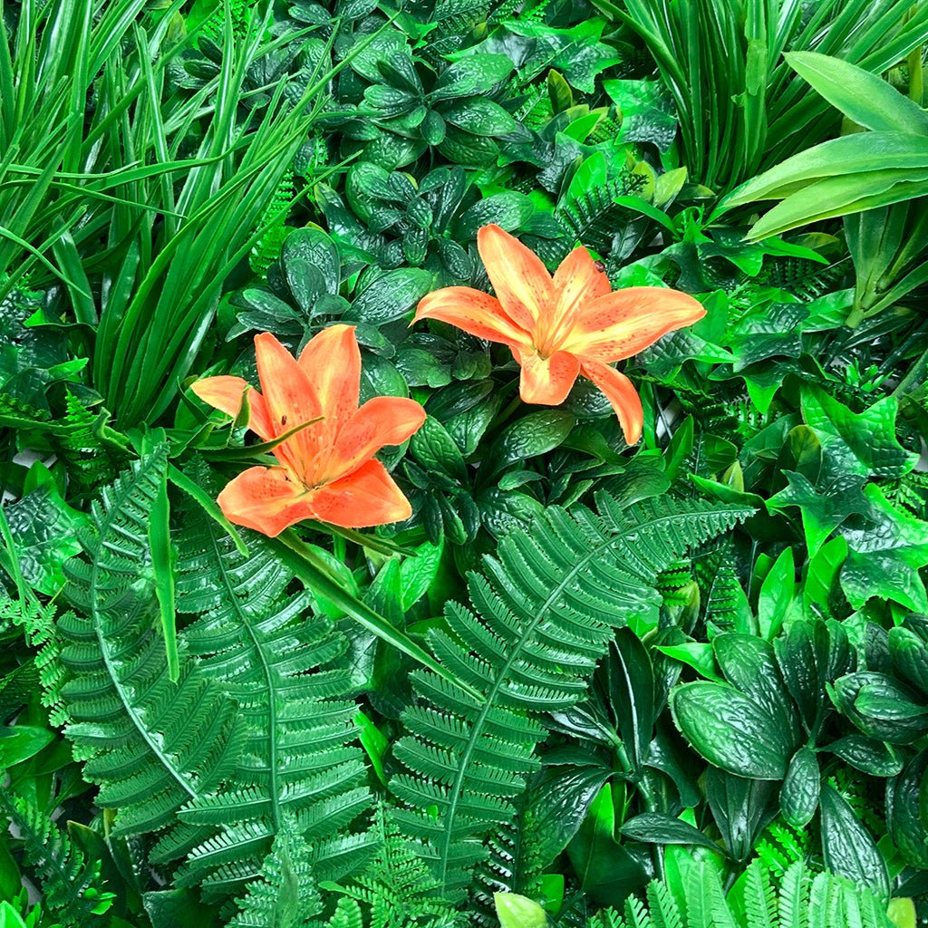 Artificial green foliage wall panel with orange tiger lilies among fern and grass leaves