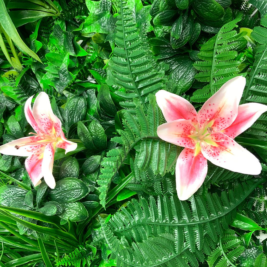 Artificial green foliage wall panel with fanned leaves and pink tiger lily flowers