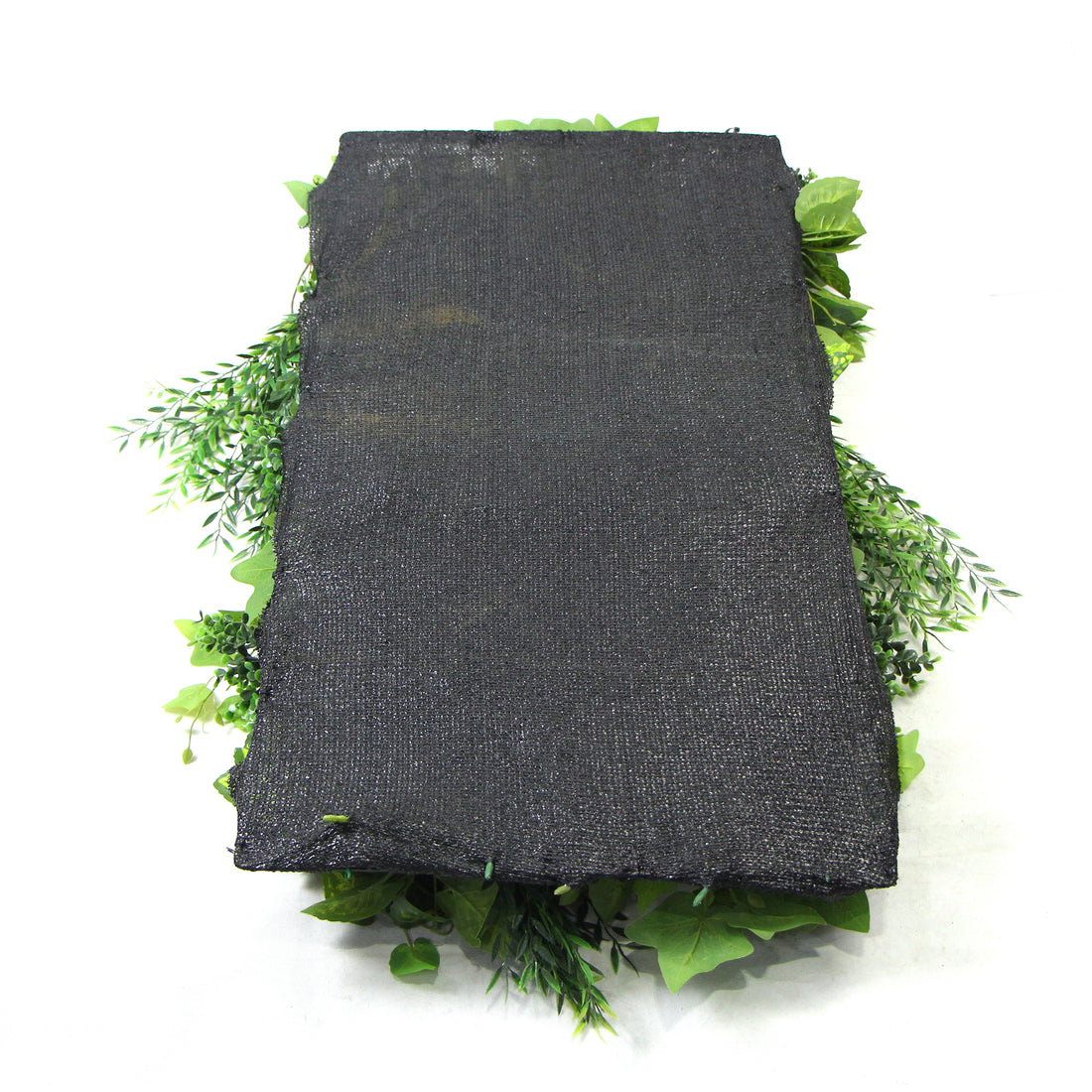 Artificial plant wall panel backing, dark fabric square with green foliage edges