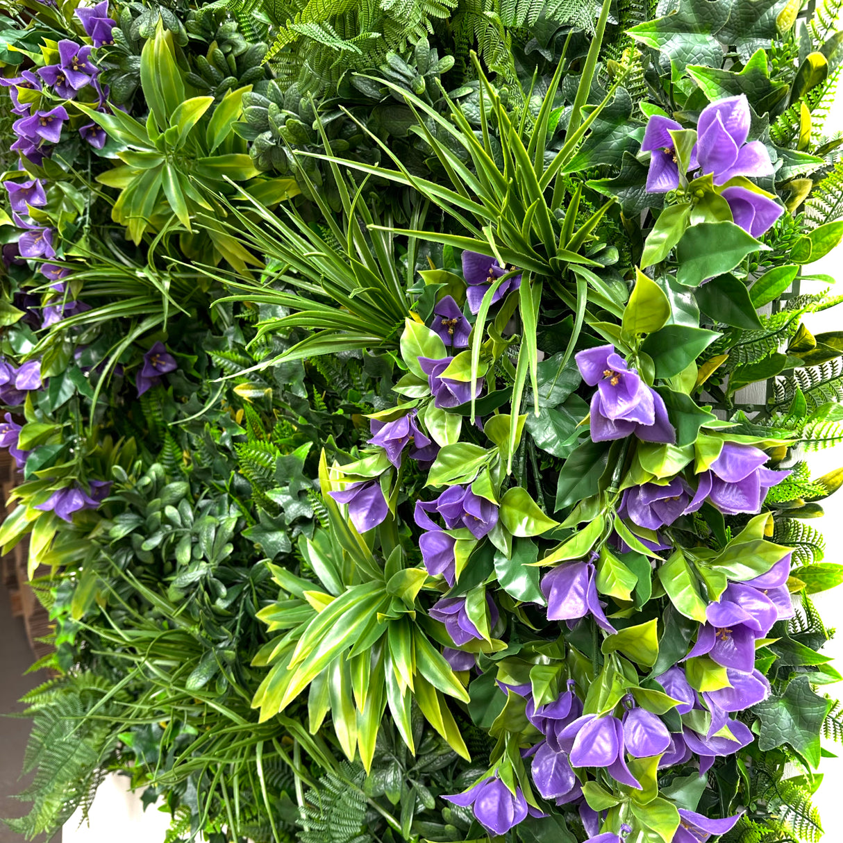 Artificial green wall panel with variegated foliage and purple trailing bougainvillea 100x100 cm