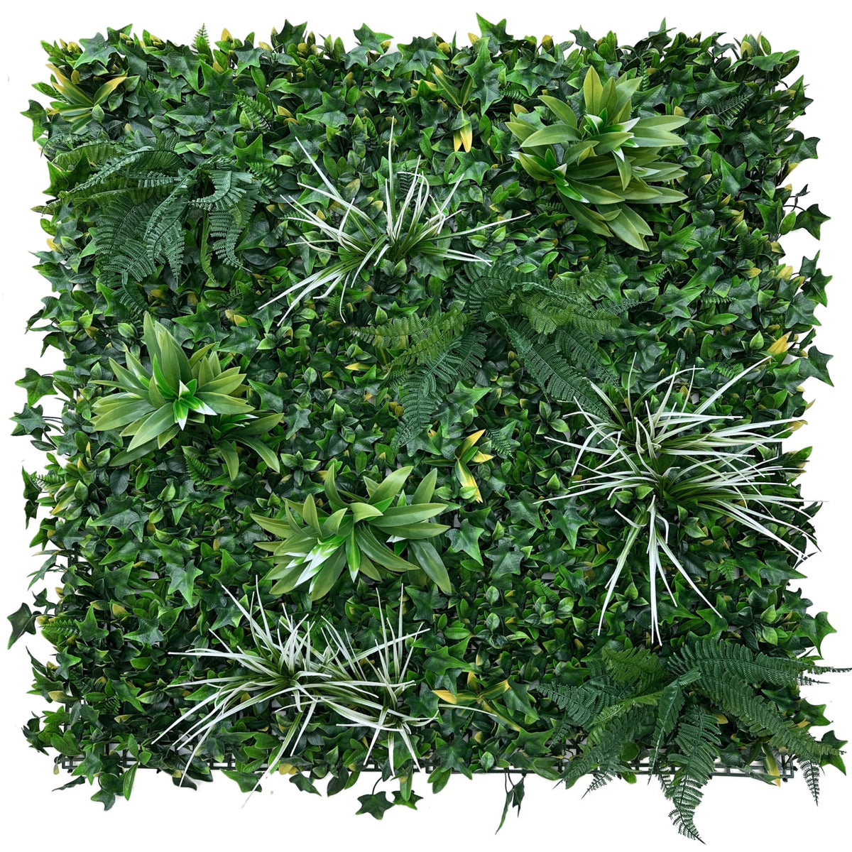 Artificial green wall panel with dense mixed foliage, white-tipped grasses and ferns