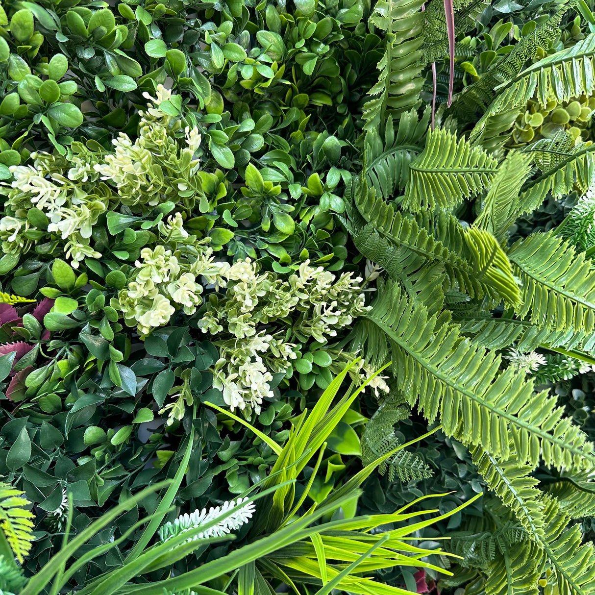 Artificial green wall 1m2 panel with mixed green foliage with yellow and white flowers