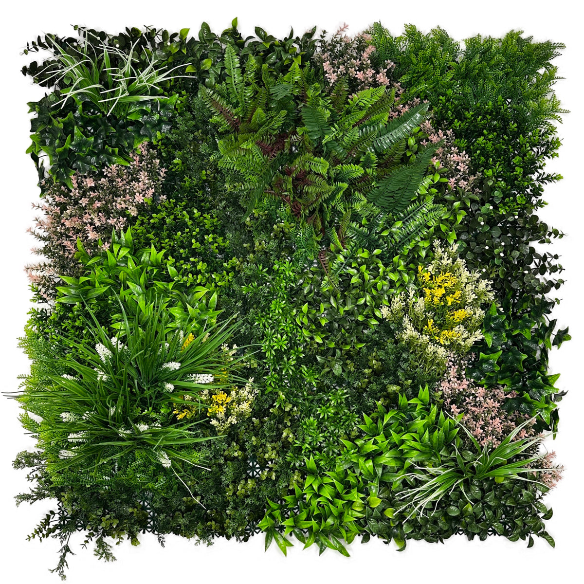 Artificial green foliage wall panel with mixed leaves, light pink flowers, and long blade-like greens