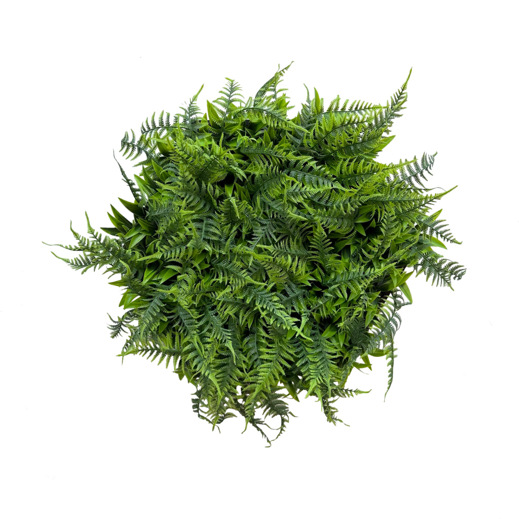 Artificial mixed green foliage in a hexagon frame