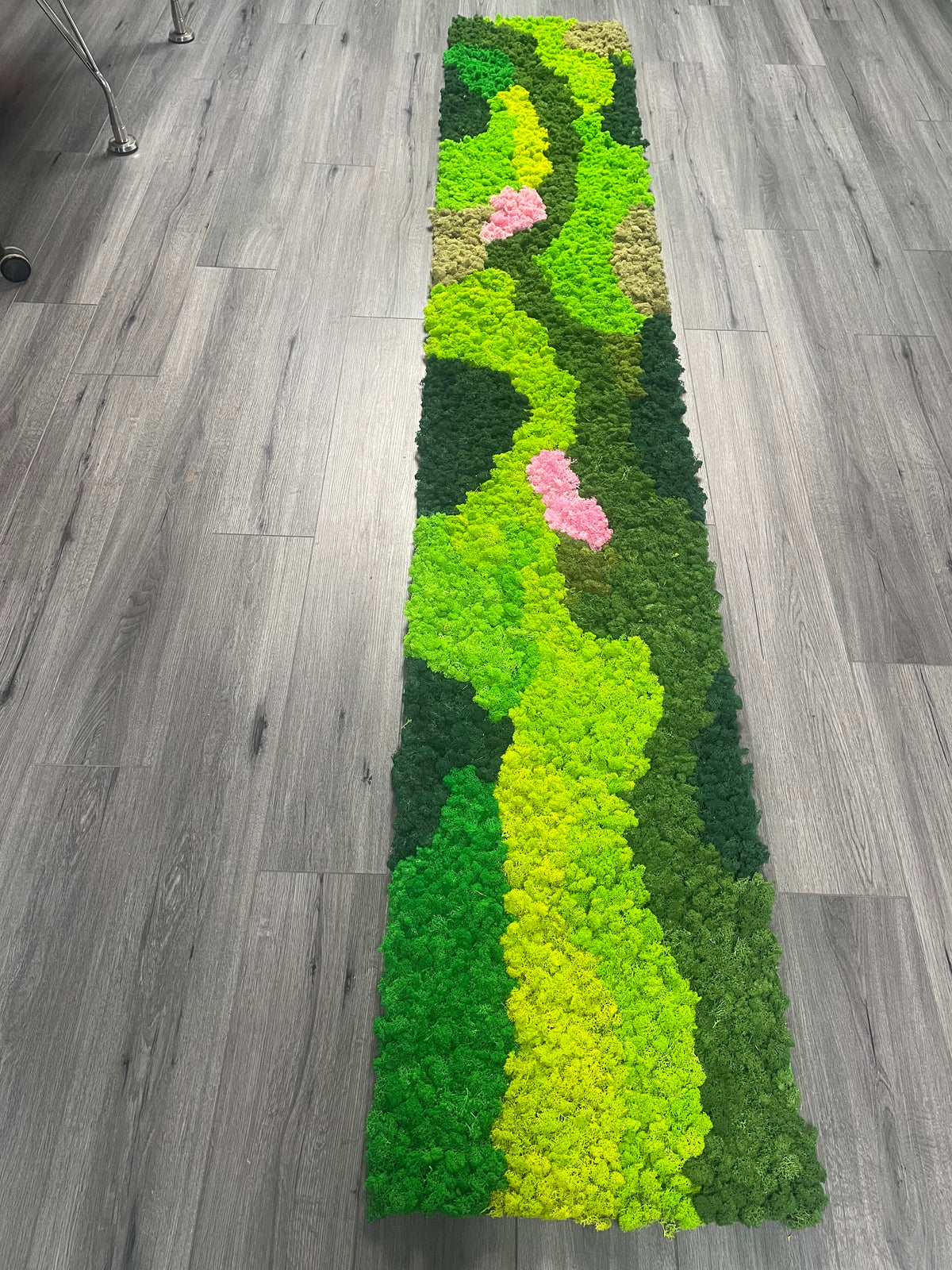 Self-adhesive preserved moss panel runner with lime green center, dark green sides, and pink spots