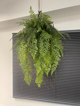 Artificial trailing fern kokedama in a black metal hanging frame 60cm wide 106cm height