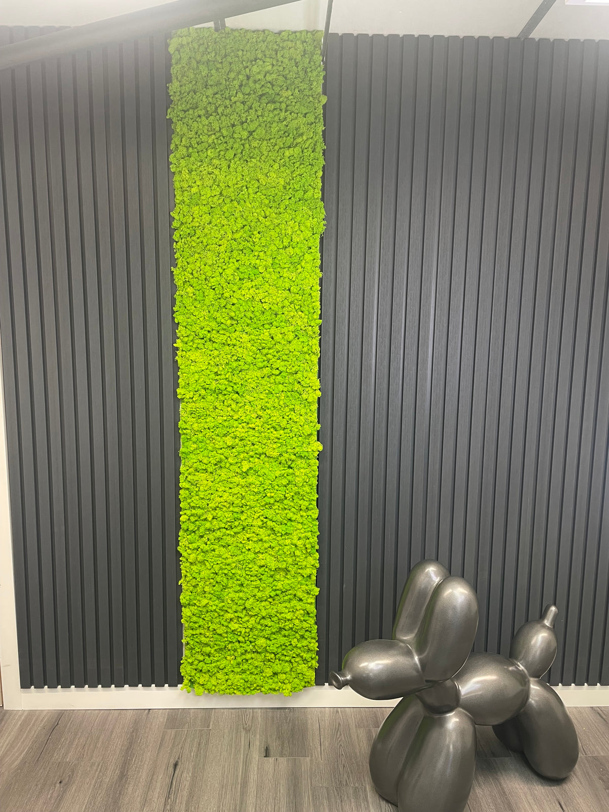 Vertical light green preserved reindeer moss self-adhesive panel on a backing