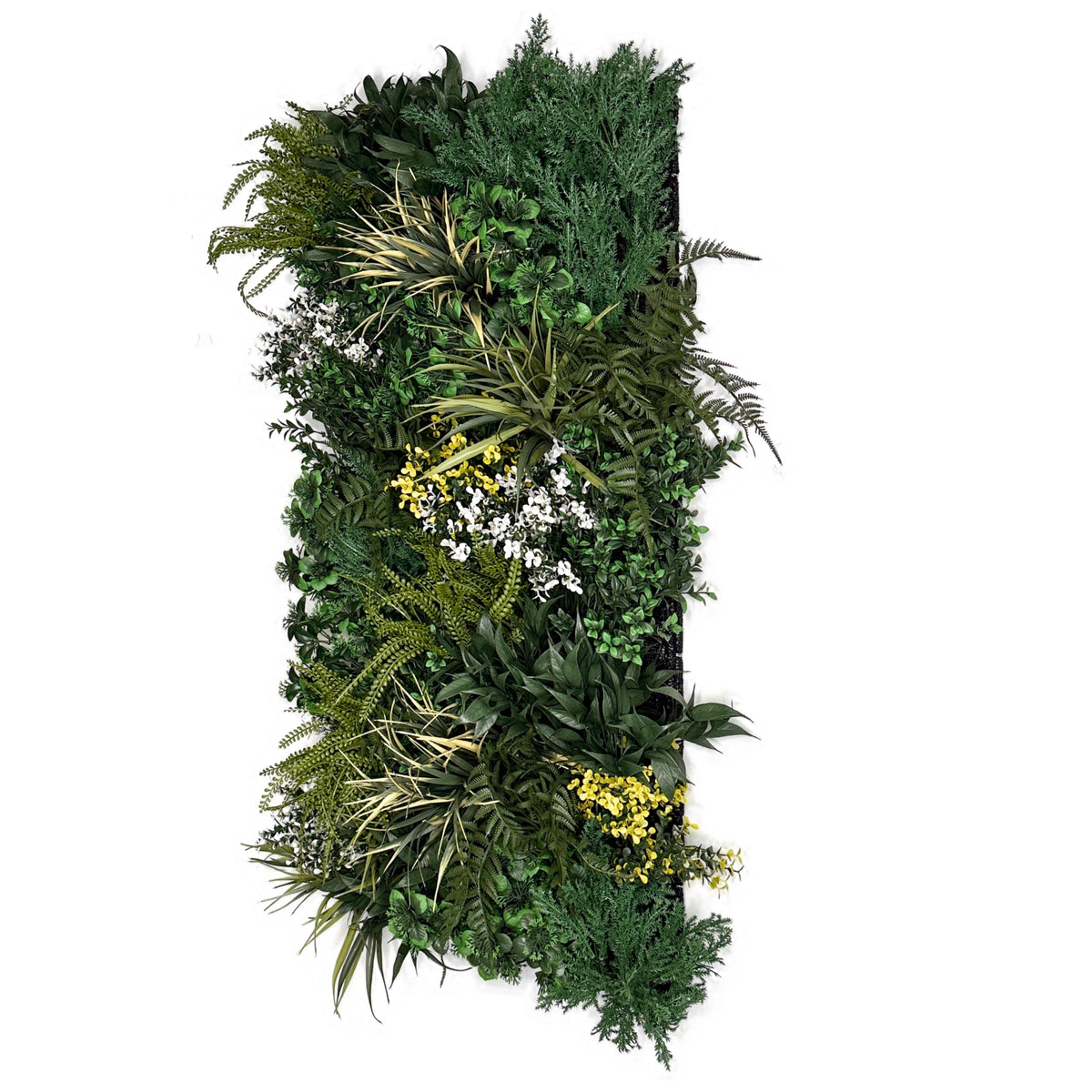 Artificial green foliage wall panel with dense leaves, fern fronds, and small white blossoms
