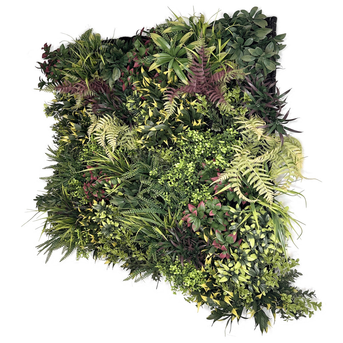 Artificial foliage wall panel with green leaves, ferns, and red/yellow accents