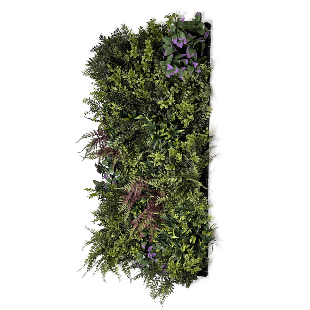 Artificial plant wall panel side view with hanging green and purple leaves.