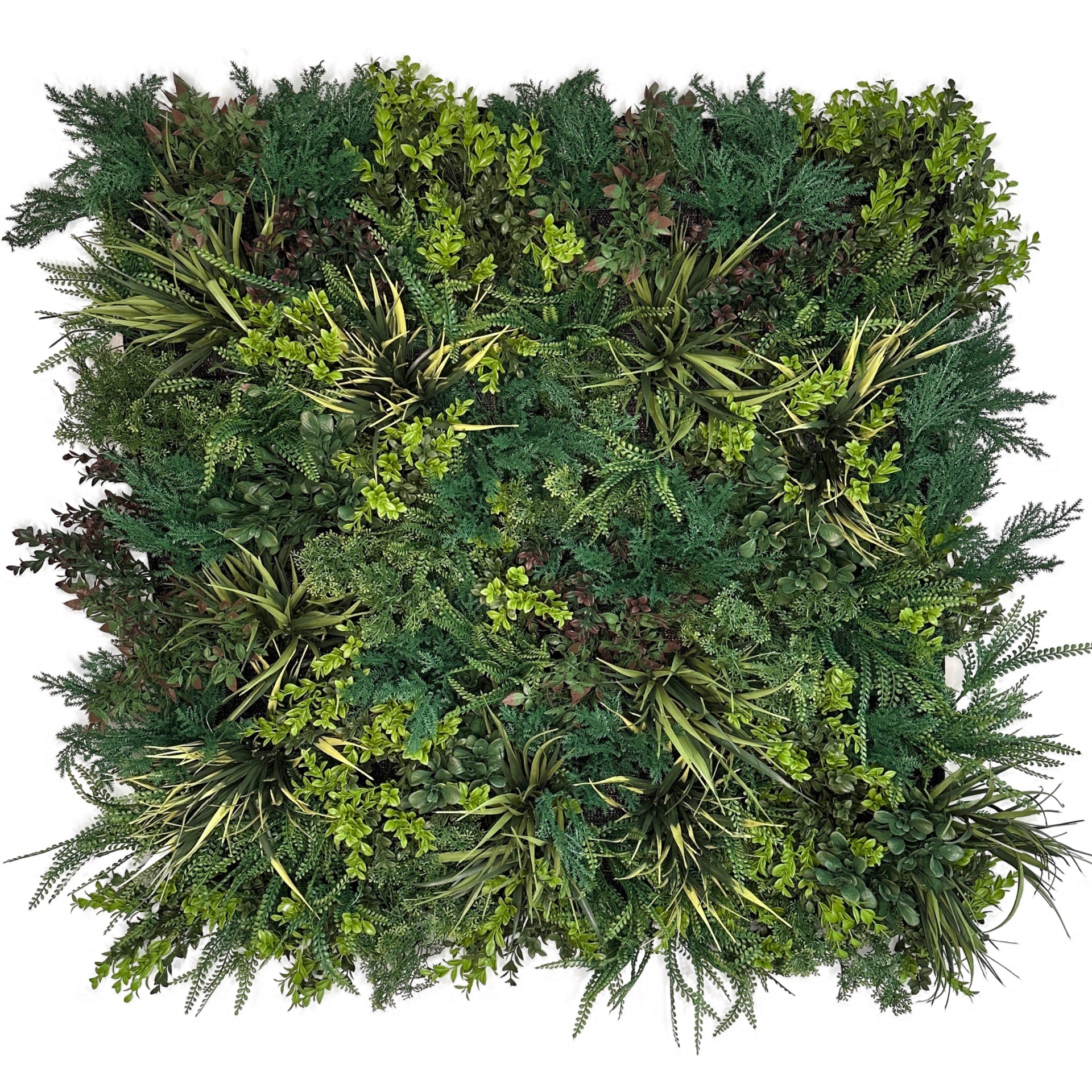 Artificial green foliage wall panel with dense bushy leaves, needles, and small yellow accents