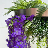 Hanging hoop with a mixture of artificial green plants with purple  trailing flowers 60cm diameter