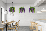 Hanging hoop with a mixture of artificial green plants with purple trailing flowers 60cm diameter