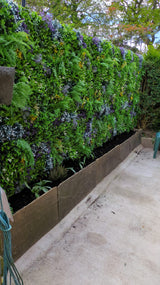 Artificial green wall 1m2 panel with mixed green, white and purple plants