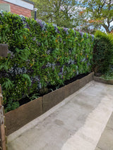 Artificial green wall 1m2 panel with mixed green, white and purple plants