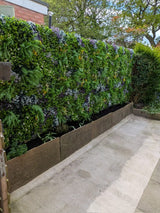 Artificial green wall 1m2 panel with mixed green, white and purple plants