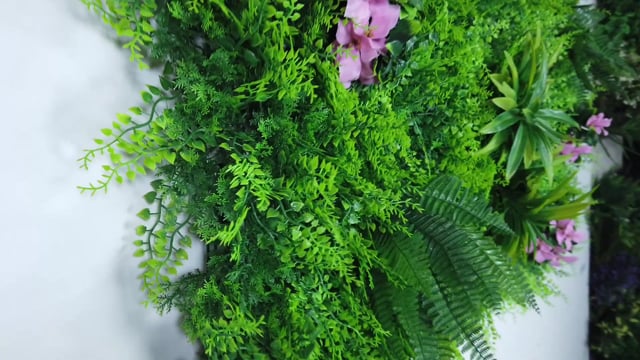 Artificial green wall panel with  ferns palms and pink flowers 100x100 cm