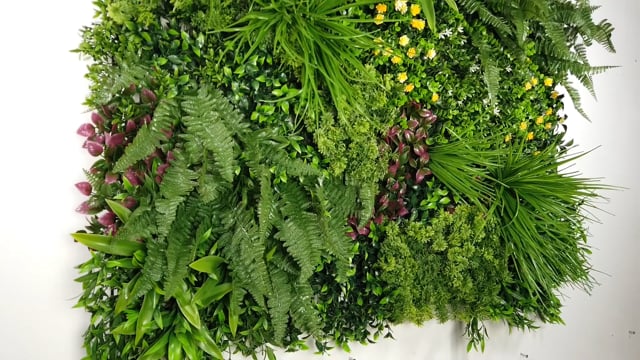 Artificial green wall panel with variegated mixed greens, red , white and yellow flowers  100x100 cm