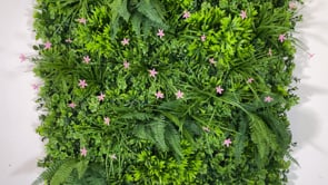 Artificial green wall panel with mixed 3d light-dark green foliage with scheffleras & pink flowers  100x100 cm