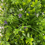 Artificial green wall panel with mixed 3d light-dark green foliage with purple & white flowers  100x100 cm