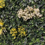 Artificial green wall panel with variegated green, red,  white & yellow foliage with ferns, palm heads, grasses & white flowers  100x100 cm